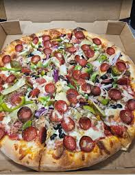 Price Rite Market and Deli signature dishes Meat Pizza, Pepperoni Pizza, Meatball Pizza.